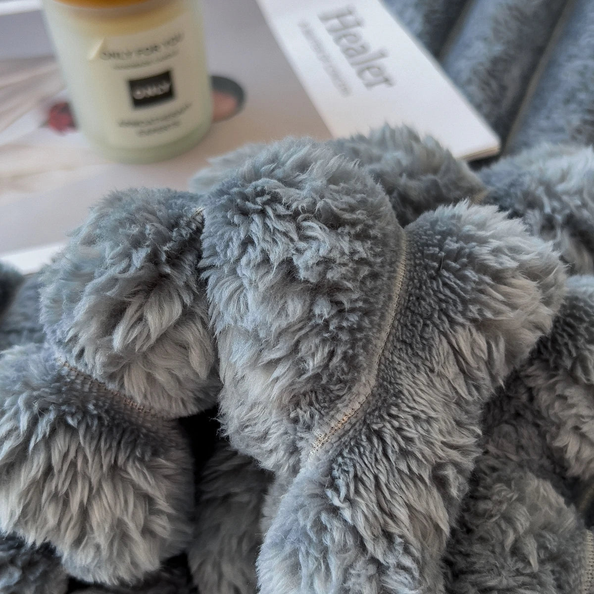 Solid color thickened wide striped multifunctional blanket