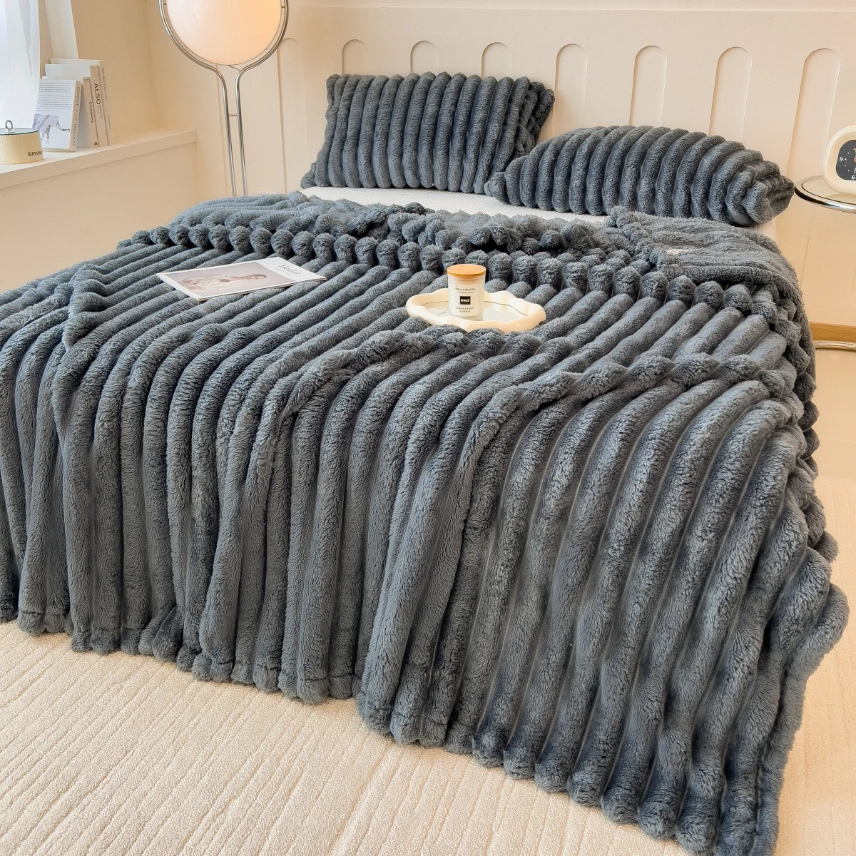 Solid color thickened wide striped multifunctional blanket
