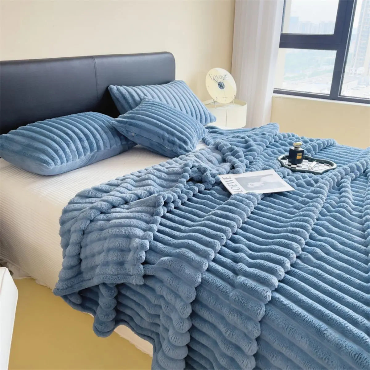 Solid color thickened wide striped multifunctional blanket